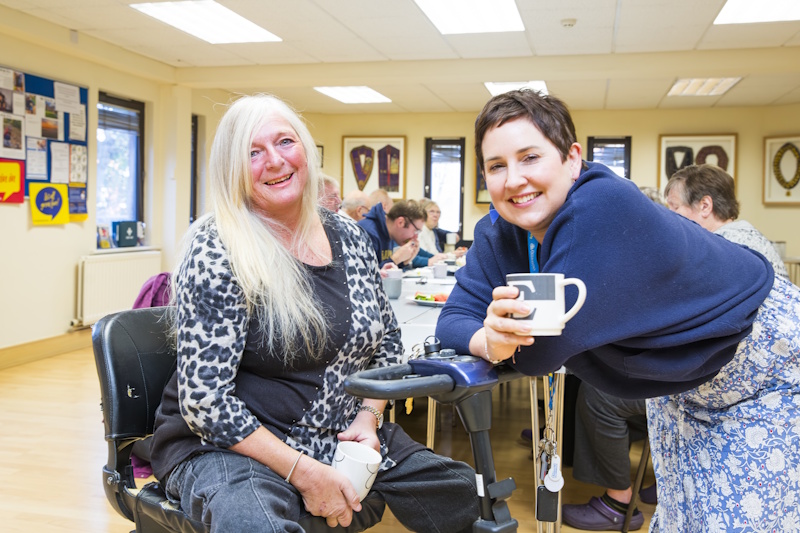 Tow women smiling at the camera