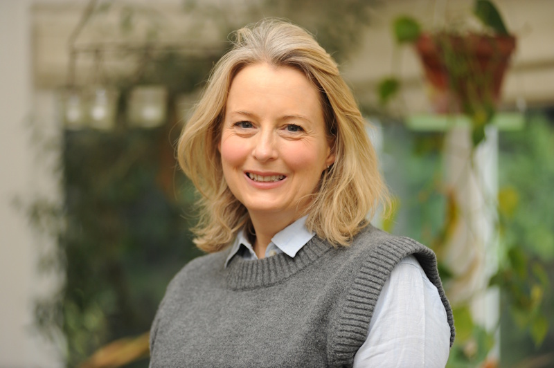 Dr Anna Machin looking into the camera, smiling